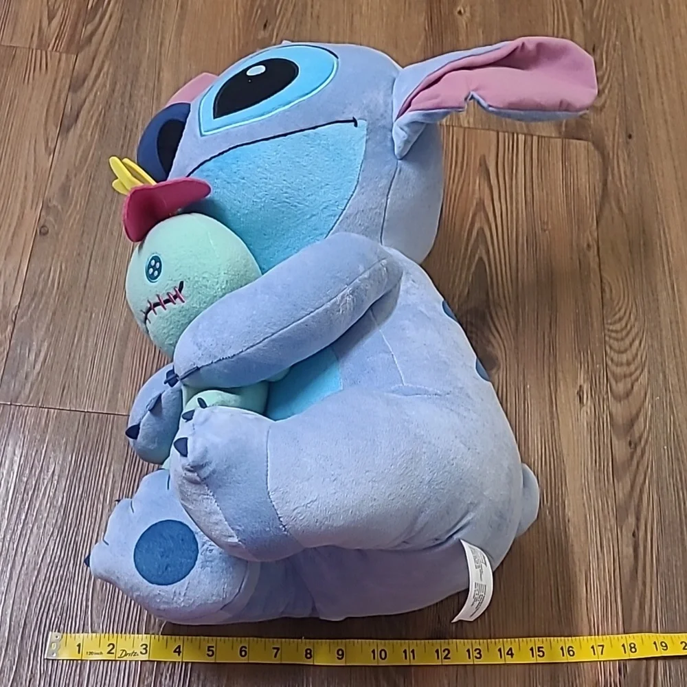 Disney Blue and‎ Pink Stitch Plush with Green Doll used good condition.